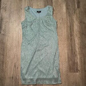 Green sparkly midi dress with a scoop neckline and a zipper on the side. Size: M